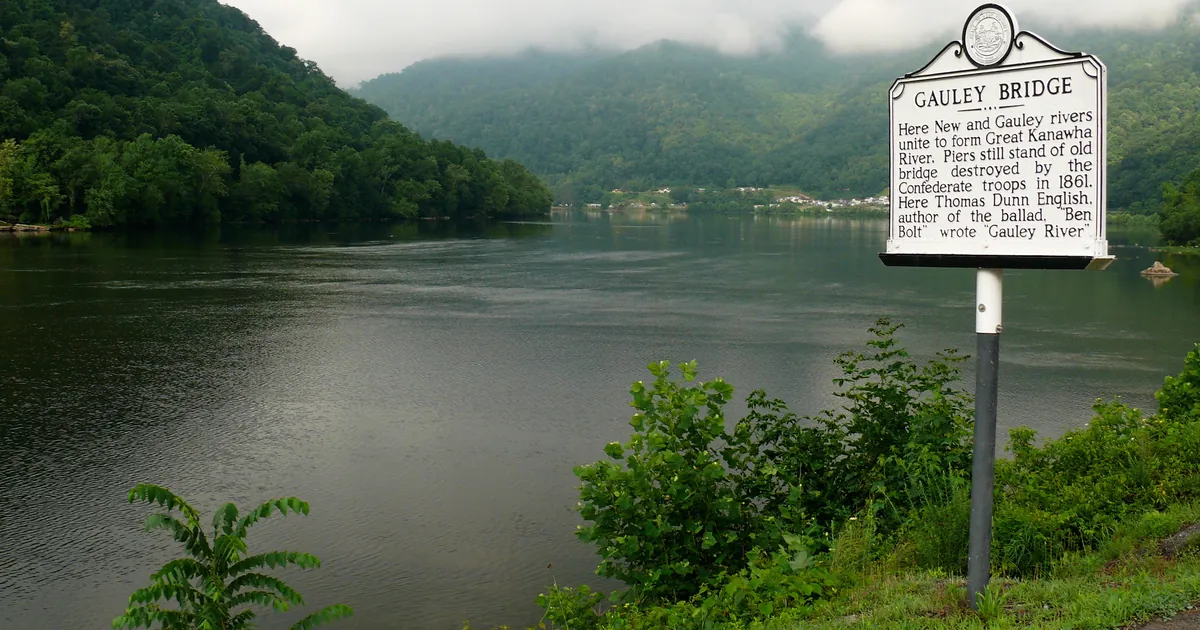 The confluence of the New River and the Gauley River at Gauley Bridge, West Virginia, where the Kanawha River begins, photographed on 15 June 2008.