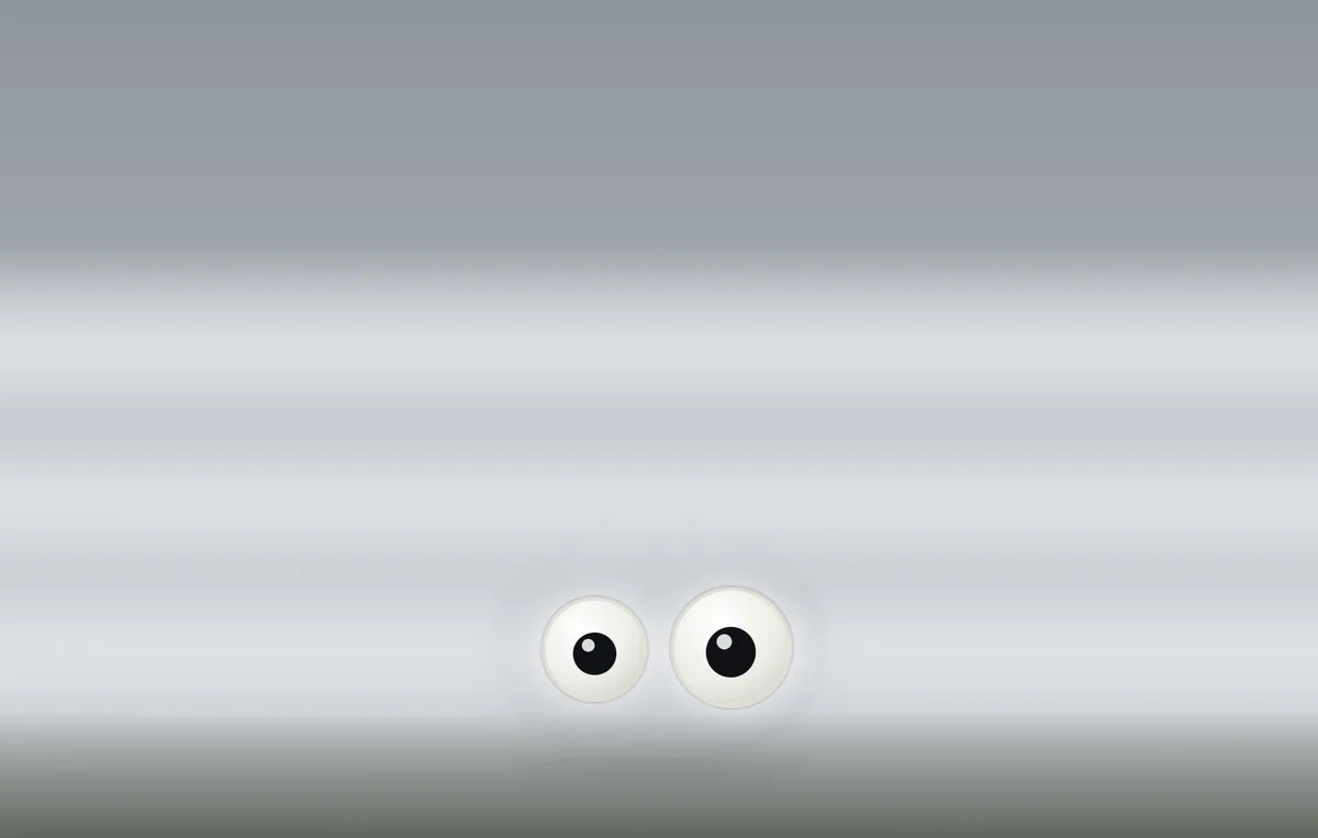 The weather rock almost hidden in thick fog, only its eyes glowing through.